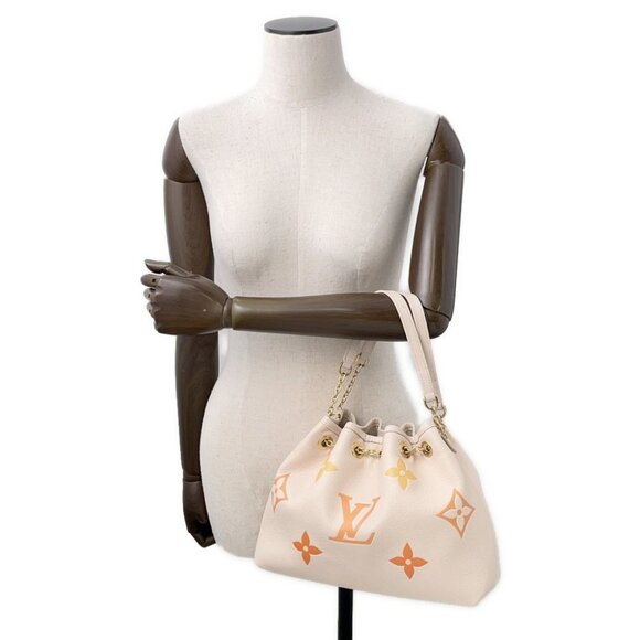 LOUIS VUITTON LV Summer Handle Monogram Empreinte Leather Beige M46545 - Picture 4 of 16